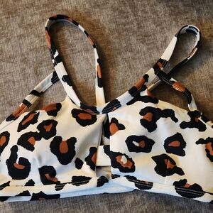 Bombshell Sportswear White Leopard Print Sports Bra with Black and Brown Spots